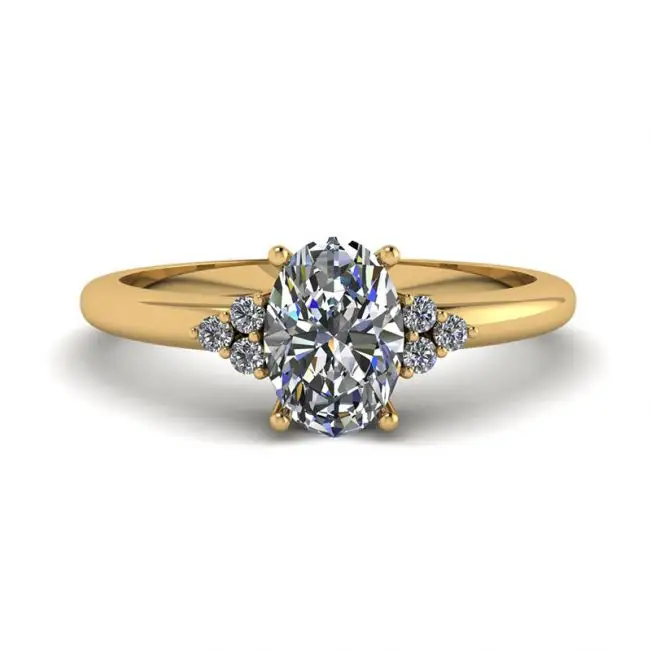 Oval Diamond with 3 Side Diamonds Ring Yellow Gold
